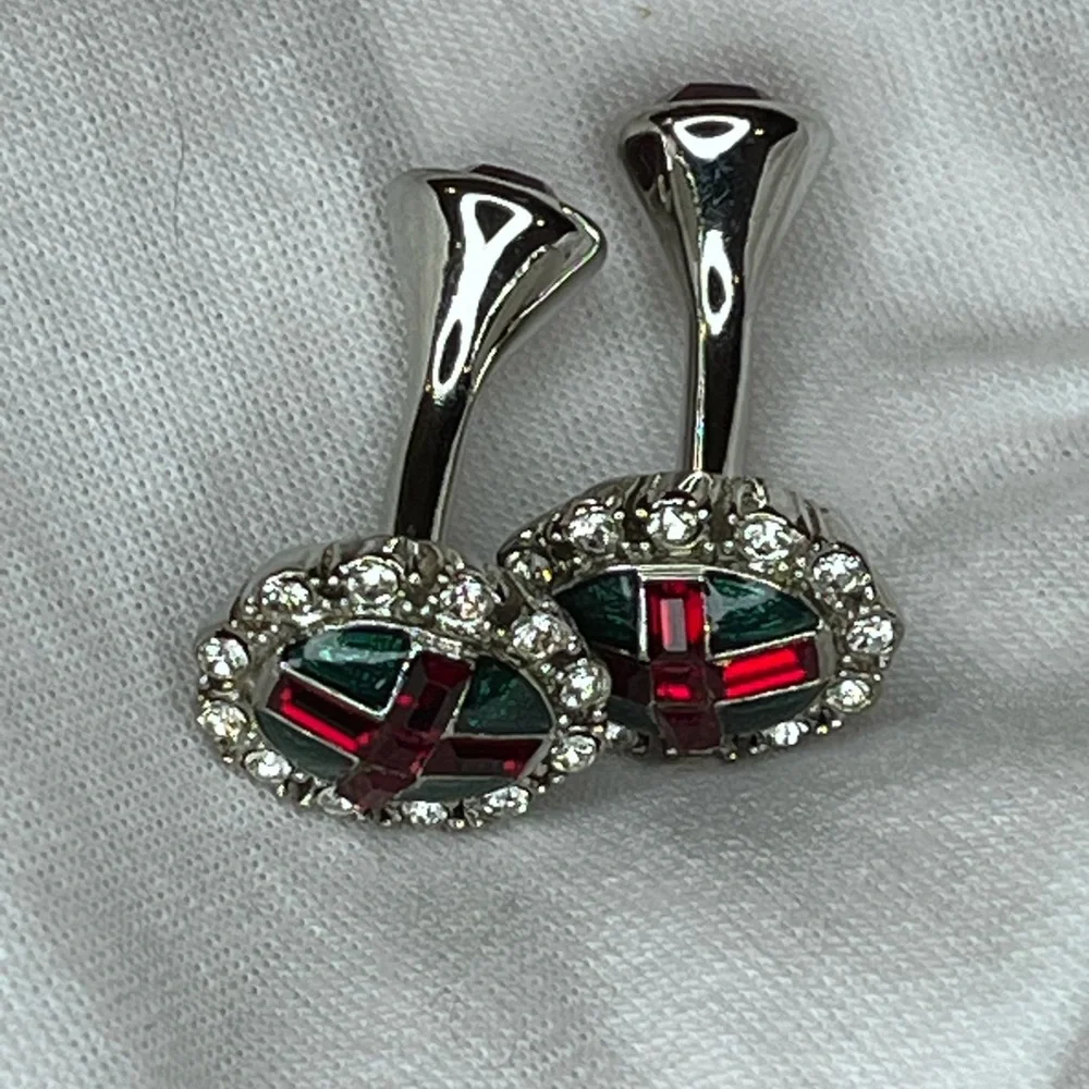 Cufflinks with St. George’s Cross pattern on green background